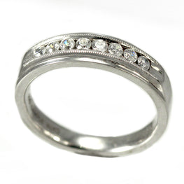 Sterling Silver Channel Set Wedding Band With Cubic Zirconias